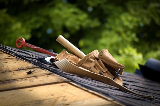 Reroofing a house is expensive but necessary